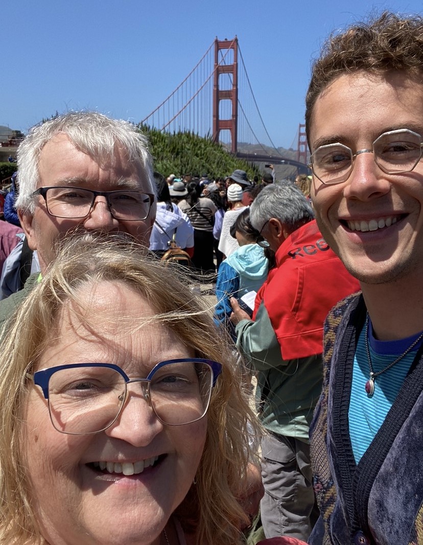 Sara, Terry and her son in front of the Golden State Bridge