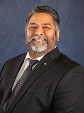 man with beard in suit and tie