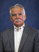 gray haired man with mustache
