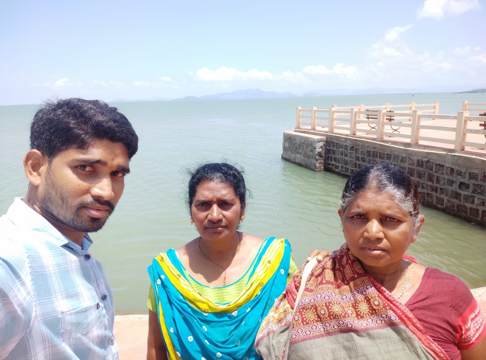 Father Kunal with his aunt and mother