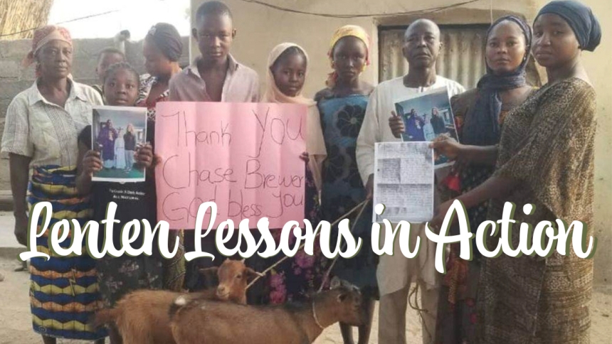 African family with goats