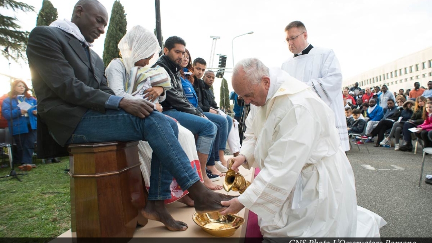 Pope Francis washing mans feet