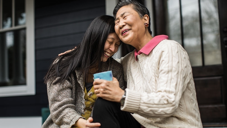 grandma and granddaughter laughing 