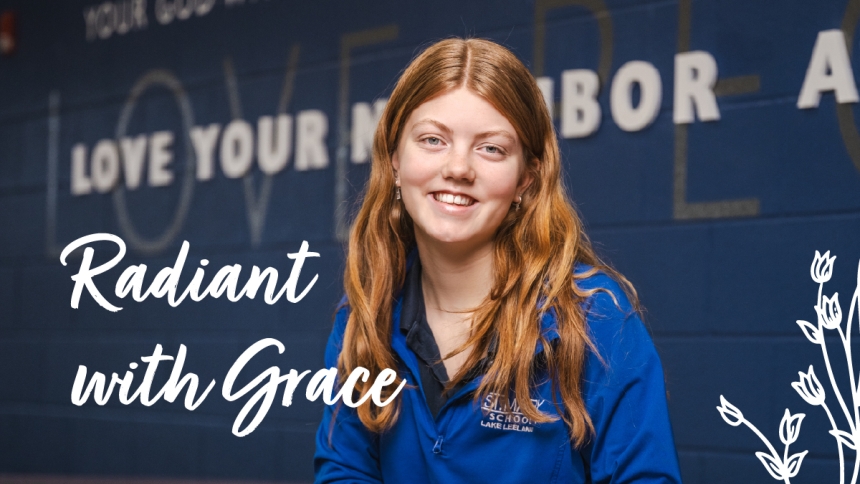 high school girl sitting in lunch room